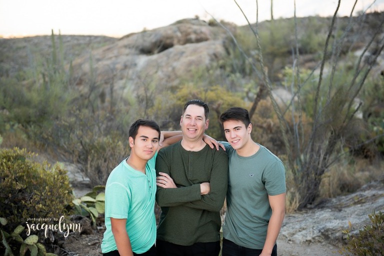 sons with their father in the desert