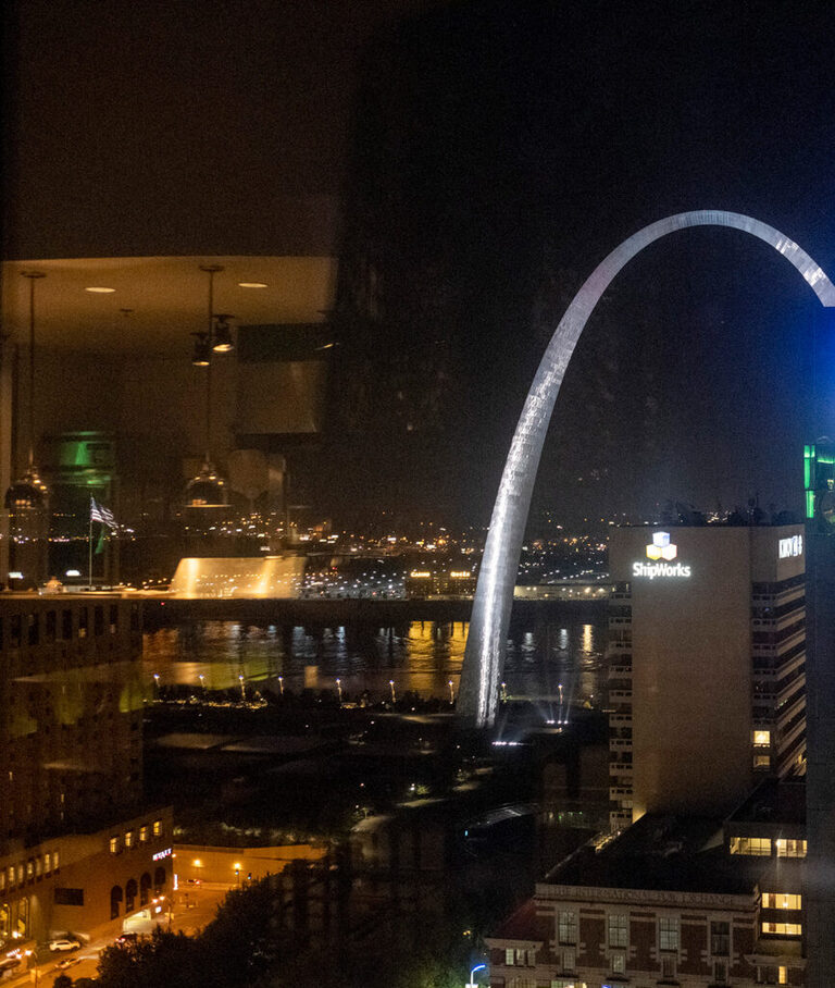 view of arch from rooftop at night in st louis missouri