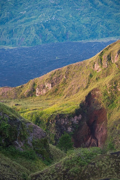 layers of rock and volcanic remnants at the top of Mt. Batur in Bali Indonesia